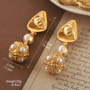 Close-up detail of vintage-style pearl drop earrings showing size and weight specs