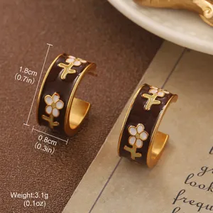Detail view of vintage enamel flower hoop earrings with size and weight measurements