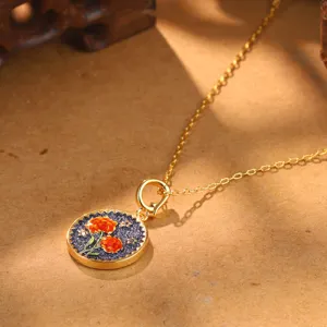 Vintage Chinese style round pendant necklace featuring intricate orange flower pattern