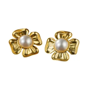 Vintage gold flower stud earrings with white pearl center in classic court style