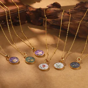 Collection of six vintage gold necklaces with colorful enamel birth flower pendants