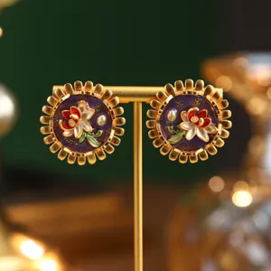Close-up detail of vintage Monet inspired enamel flower earrings with pearl accents