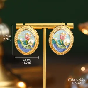 Détail montrant les dimensions et le poids des boucles d'oreilles fleurs en émail