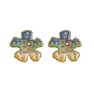 Oil painting style flower stud earrings featuring colorful enamel and cubic zirconia