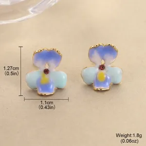 Close-up of enamel flower earrings showing 1.27cm height and 1.8g weight detail