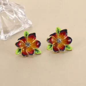 Vintage-Emaille-Blumenstecker mit bunten Blütenblättern und Kristallmitte