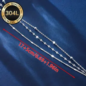 Close-up detail of 304L stainless steel stackable bracelets showing various chain styles