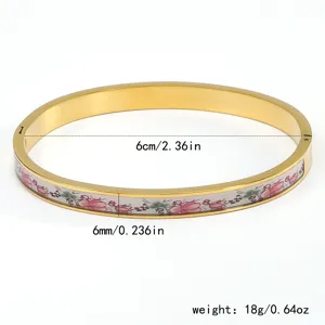 Detailansicht eines Vintage-Emaille-Armreifs mit 18K Vergoldung und Abmessungen.
