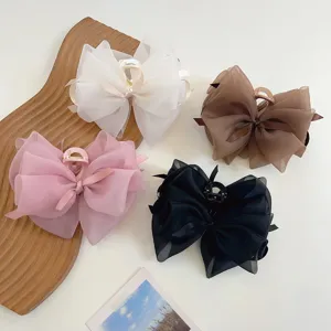Set de pinzas para el cabello con lazo de malla grande en blanco, rosa, marrón y negro.