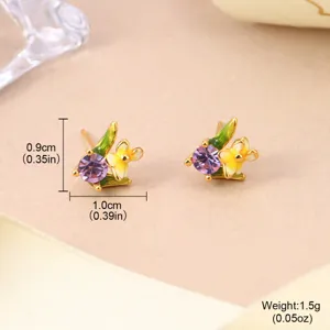 Detailed macro view of enamel floral stud earrings featuring purple crystals and size info.