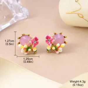 Detailed view of floral enamel stud earrings showing dimensions and 4.3g weight.