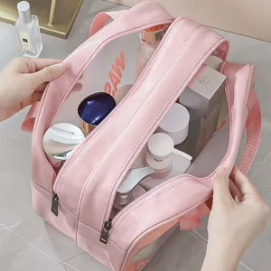 Pink large capacity semi-transparent PVC cosmetic bag, dual zipper toiletry storage organizer.