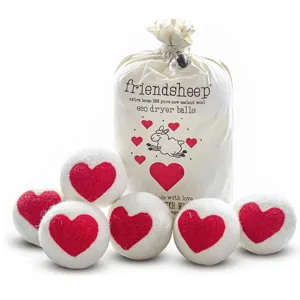 Set di palle per asciugatrice in lana neozelandese con cuori rossi e borsa in cotone bio
