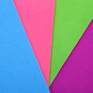 Detailed texture view of vibrant multi-colored DIY felt sheets for craft projects