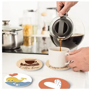 Round 3.15 inch sublimation coasters used under a coffee mug in a kitchen setting