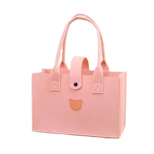Cute pink felt tote bag featuring bear embroidery and button closure for daily shopping