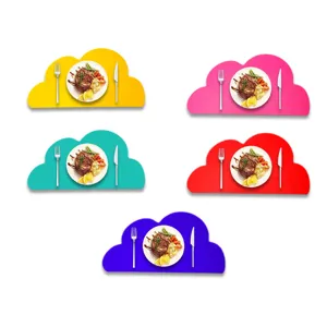 Set of colorful cloud-shaped felt placemats for festive dining table protection