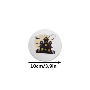 Detailed view of Halloween felt coaster with haunted house print and 10cm diameter.
