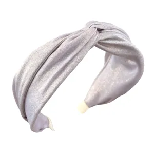 Elegante glinsterende paarse geknoopte stoffen hoofdband met een breed randontwerp