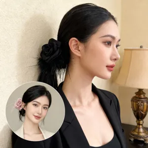 Elegant handmade satin camellia flower hair scrunchie featuring luxury ostrich feather details