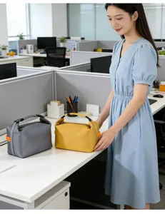 Portable insulated lunch bag for office workers, waterproof thermal food tote with handle.