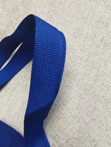 Blue woven strap detail for beach bag, durable nylon material, fine texture, high quality.