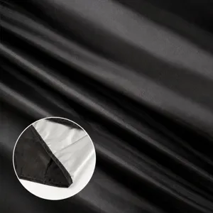 Thickened silver-coated car windshield sunshade cover fabric showing durable waterproof texture.