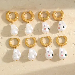 Detail showing 18K gold plated stainless steel hoops with crystal baroque pearl drops.
