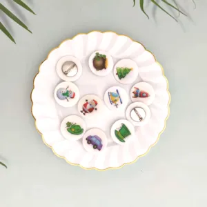 Set of cute cartoon badges with Christmas and St. Patrick's Day themes on a white plate
