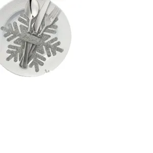Grey felt snowflake cutlery holder for Christmas table decoration with silverware