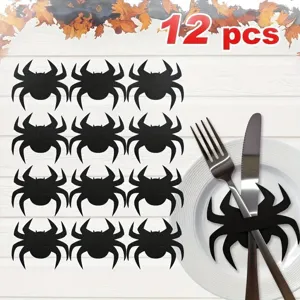Set of 12 black bat felt cutlery holders and napkin rings for Halloween party table decor.