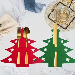 Festive red and green Christmas tree felt cutlery holders for holiday dining table decoration