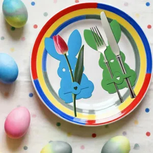 Blue and green felt bunny cutlery holders for festive Easter party table setting