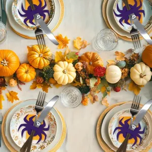 Purple spider cutlery holders for festive Halloween table settings and party decor.