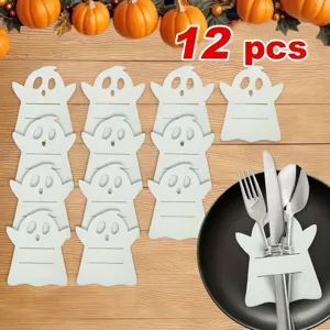 Set of 12 white ghost-shaped cutlery holders for festive Halloween table decor.