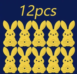 Set of yellow rabbit-shaped felt cutlery holders for Easter holiday table decoration