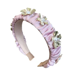 Elegant pink pleated headband decorated with gold metal flowers and white pearls