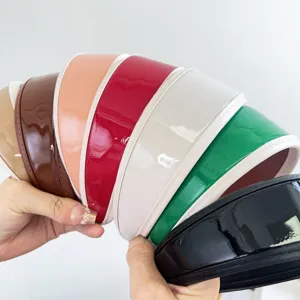 Selection of vibrant glossy PU leather wide headbands in multiple retro colors for women