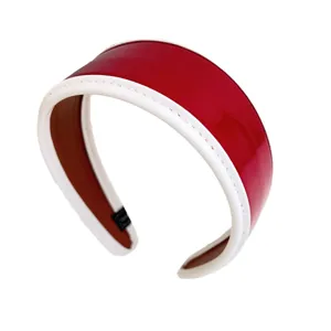 Retro glossy red PU leather wide headband with white piping and stitch detail