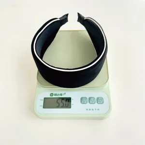 Detail view showing the 55g weight of the black velvet sponge padded headband on a scale