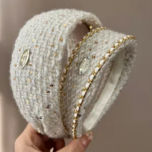 Elegant beige tweed headband set with sequins and gold chain for a chic high-crown look