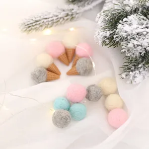 Handmade wool felt ice cream cone ornaments for festive Christmas tree and gift decoration