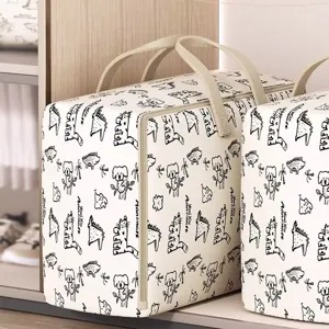 Vista detallada de la bolsa de almacenamiento grande con patrón de dibujos animados y asas.
