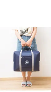 Detailed view of large capacity foldable travel duffel bag, portable luggage storage solution.