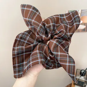 Large retro brown plaid fabric scrunchie with bunny ears design for bun hairstyles