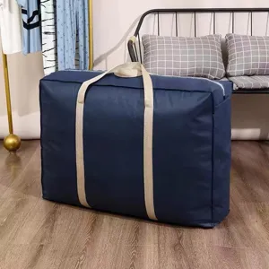 Large capacity quilt storage bag waterproof non-woven fabric clothes organizer for home.