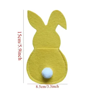 Vue détaillée du range-couverts lapin de Pâques en feutre jaune avec les dimensions