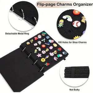 Detail showing 180 holes and detachable metal rings on black felt charms organizer