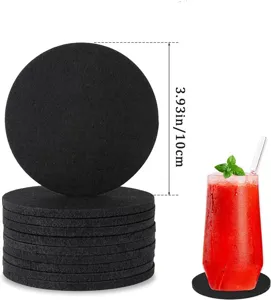 Close-up of black round felt coaster showing 3.93 inch diameter and use with glass