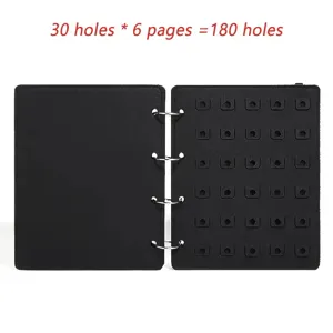 Detailed view of the black felt brooch storage organizer book with 180 holes and binder rings.